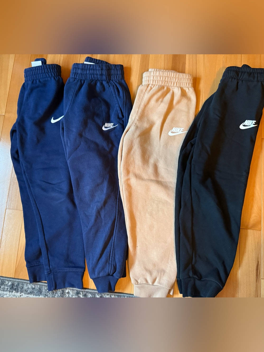 Nike Kids' 4-pair bundle Jogger Bottoms - 2-Navy, 1-Tan, 1-Black